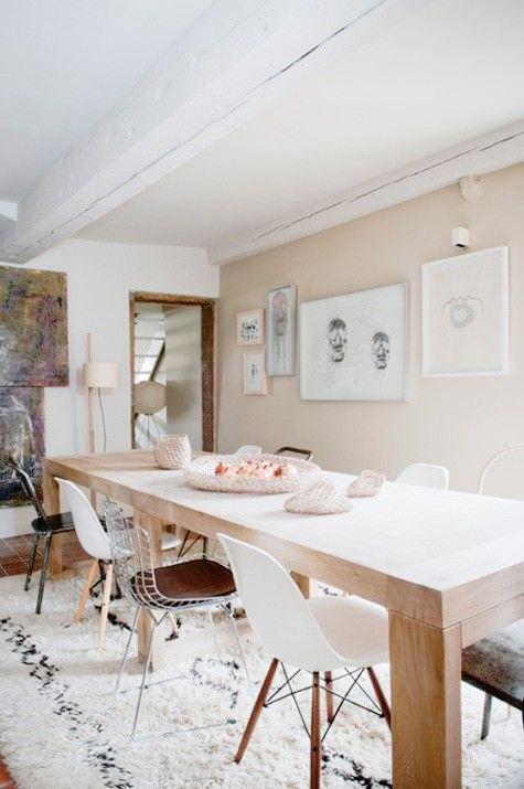 Blush dining room with mismatched chairs