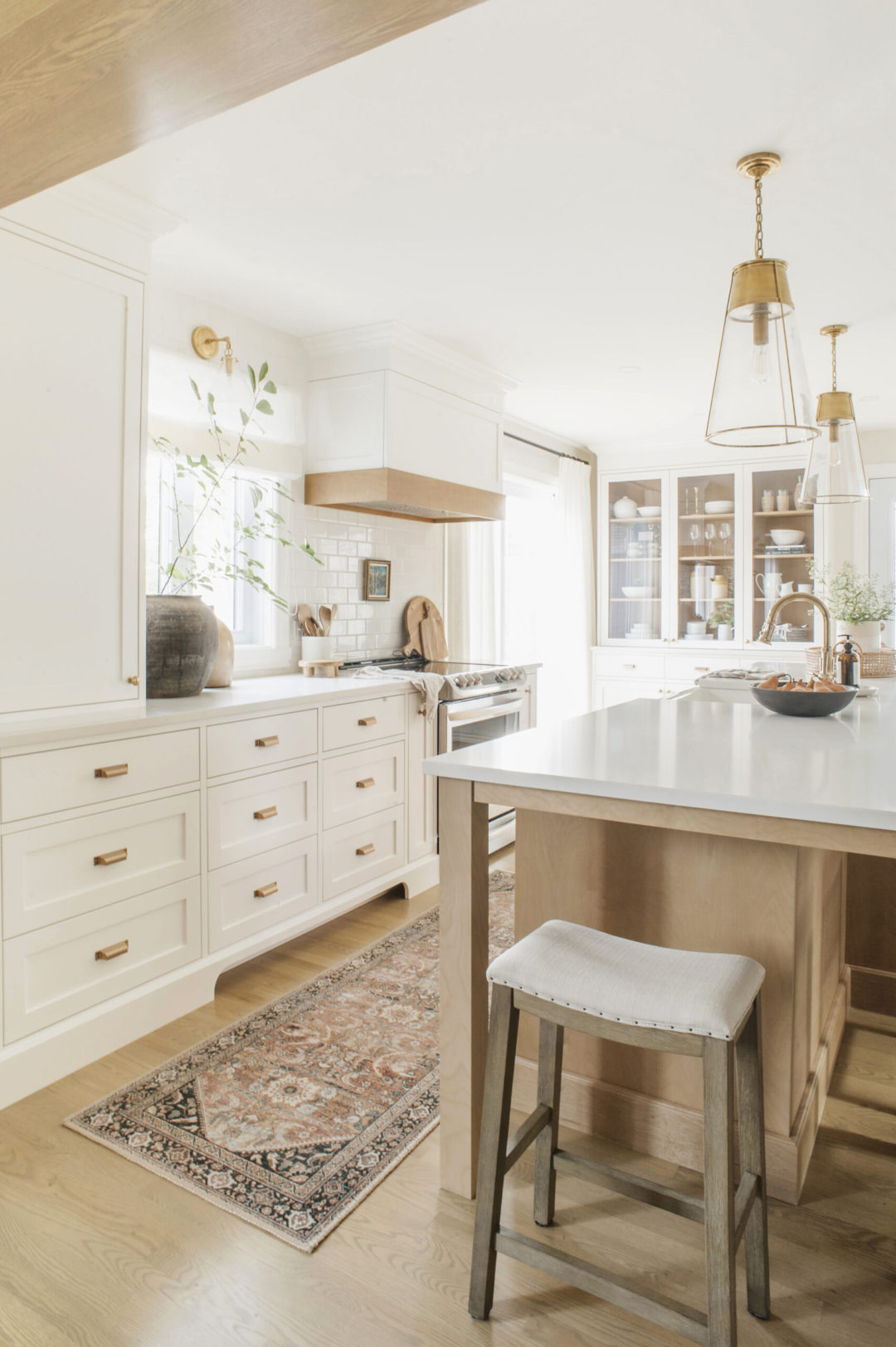 This dreamy white and wood kitchen is giving all the good vibes