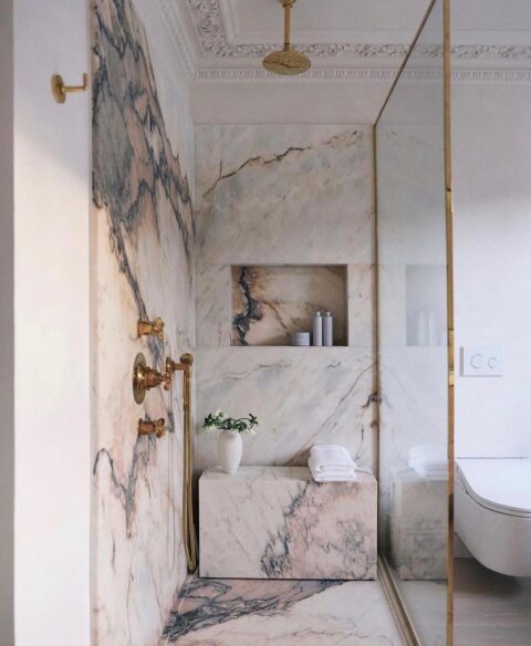 pink marble shower gold glass enclosure